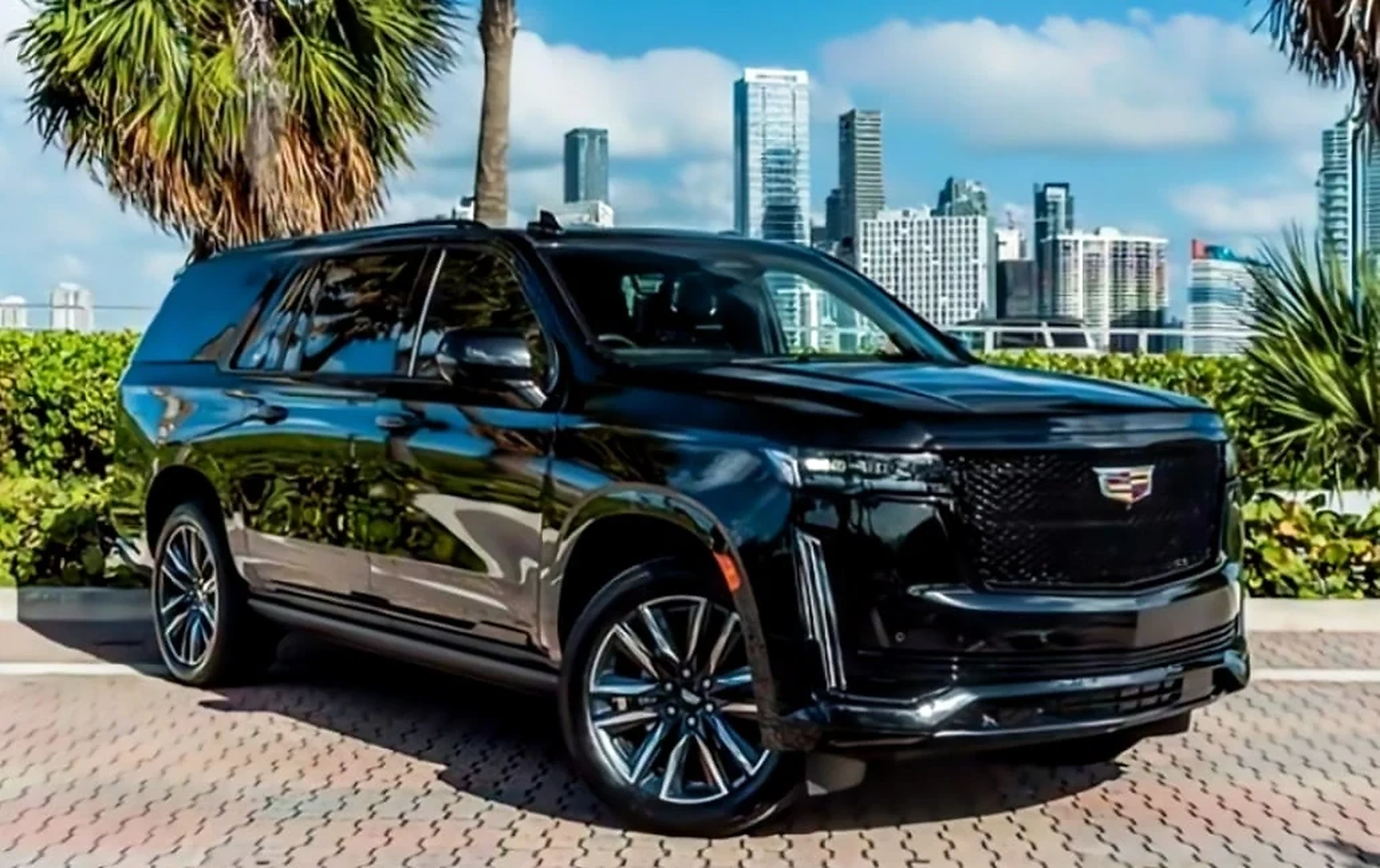 Cadillac Escalade ESV detail relevant to five-passenger luxury car rentals on ALLCARS