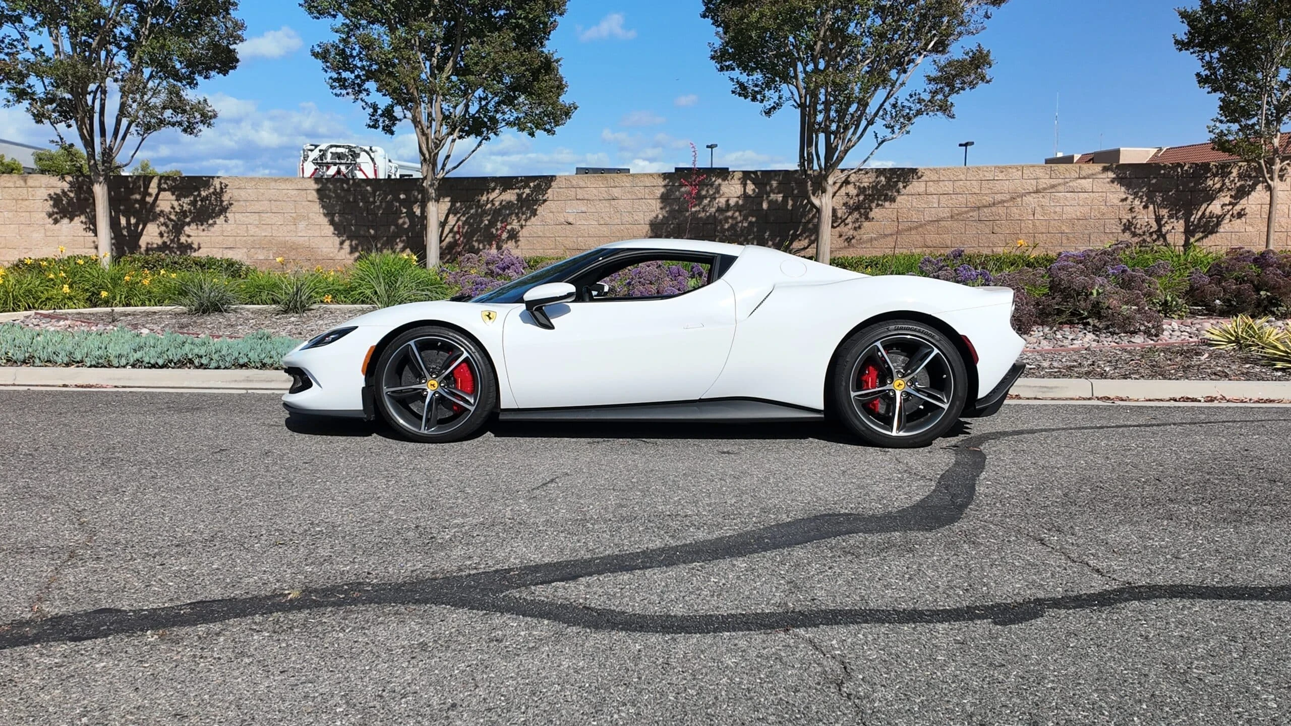 Ferrari 296 GTB detail relevant to art week luxury car rentals on ALLCARS
