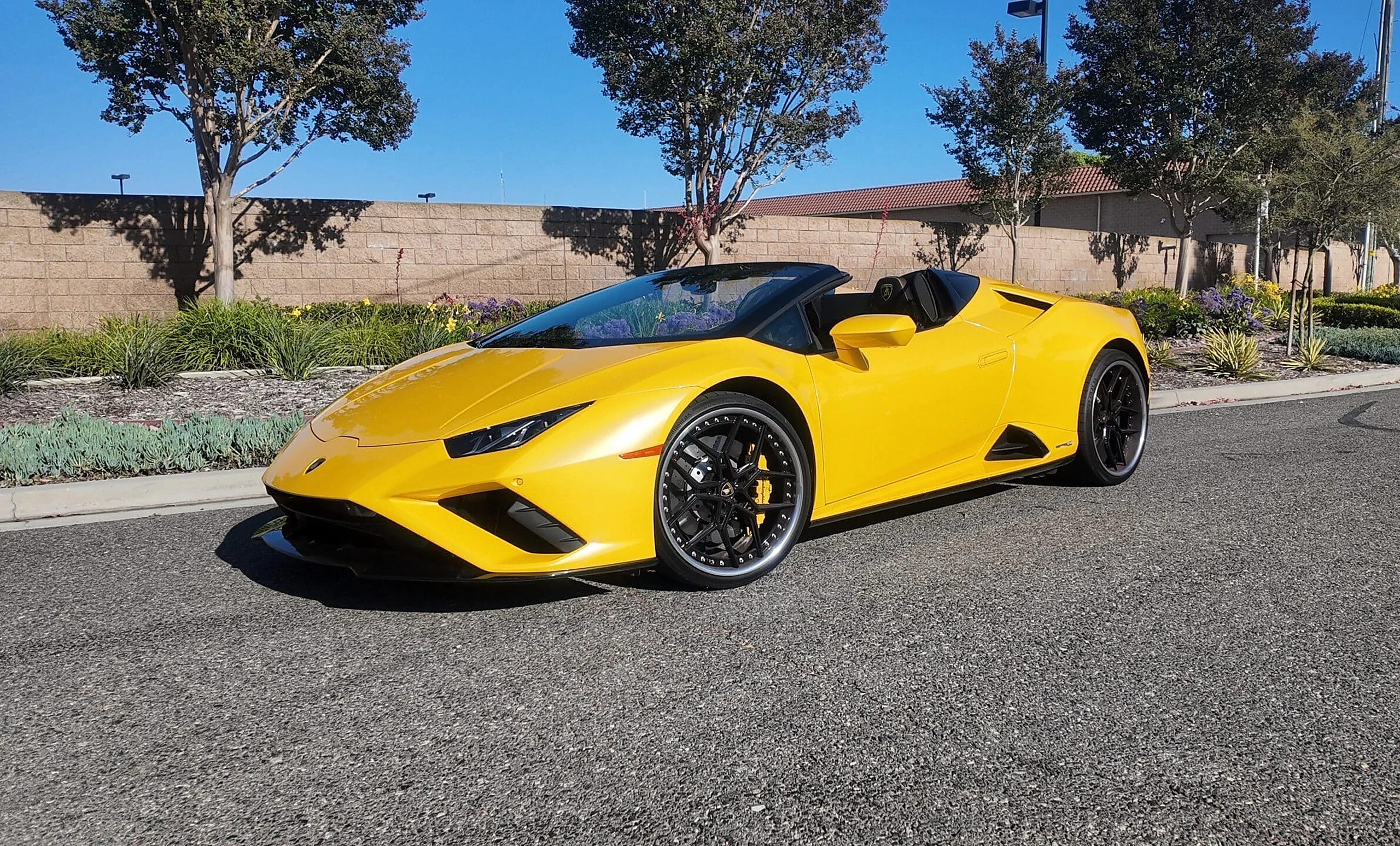 Lamborghini Huracán EVO Spyder detail relevant to multi-car exotic rental coordination on ALLCARS
